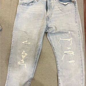 Levi’s 312 Light Blue Distressed Men's Jeans